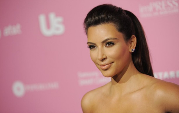 Kim Kardashian exposes again in sheer top